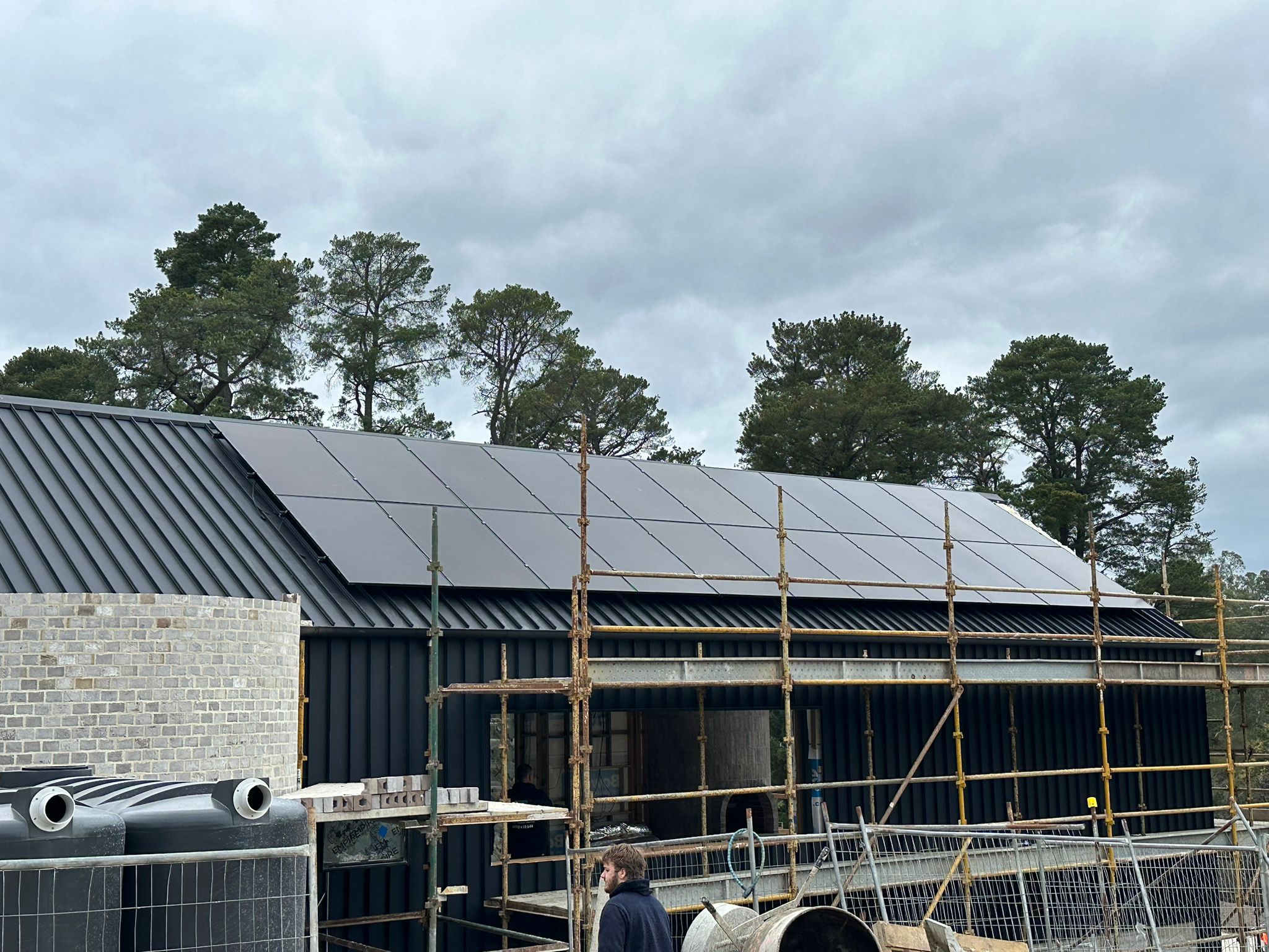 Construction site with solar panel installation in progress